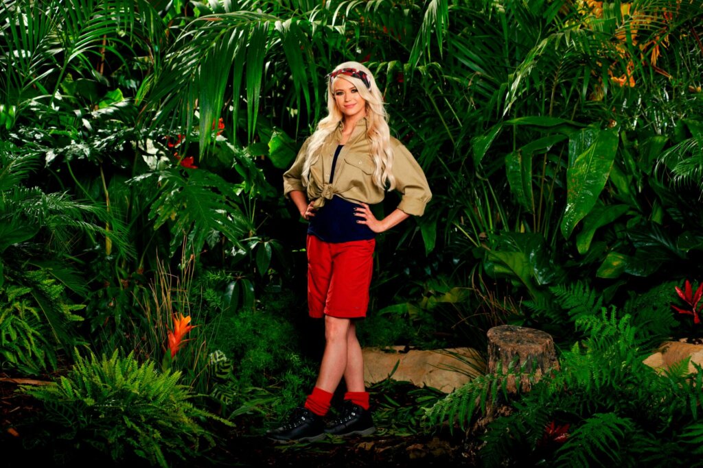Promotional photo for I'm a Celebrity… Get Me Out of Here! 2023, which sees Danielle Harold in a jungle setting, wearing the camp uniform.