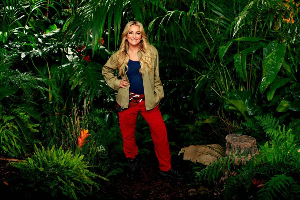 Promotional photo for I'm A Celebrity... Get Me Out Of Here! 2023, which sees Jamie Lynn Spears in a jungle setting, wearing the camp uniform.
