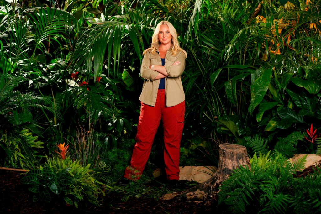 Promotional photo for I'm a Celebrity… Get Me Out of Here! 2023, which sees Josie Gibson in a jungle setting, wearing the camp uniform.