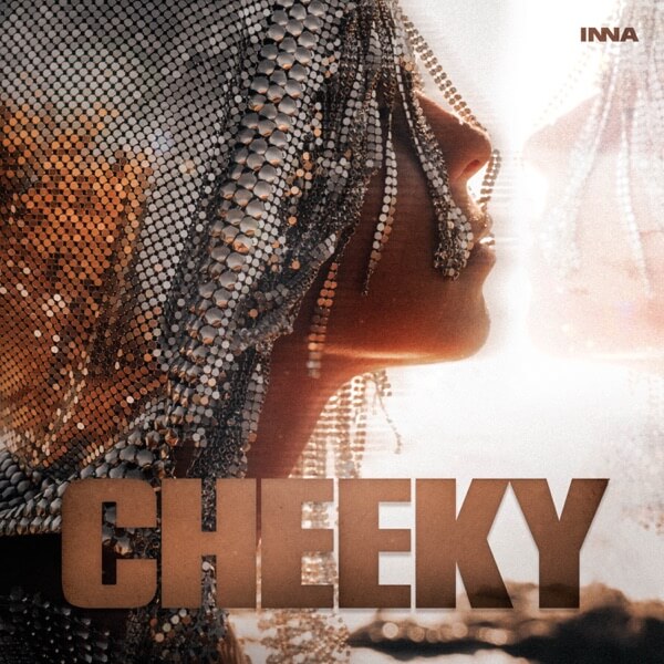 Single cover artwork for "Cheeky" which is a side image of INNA's face, showing her cheek, while she wears a metal beaded head scarf that has metal beads falling across her face.