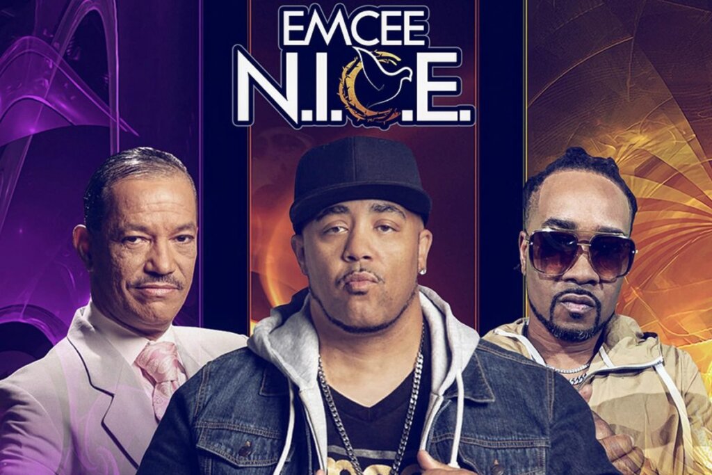 Cropped image of the official artwork for Emcee N.I.C.E.'s single "Amen Right There", which sees the artist in the forefront with the collaborators posing behind him.