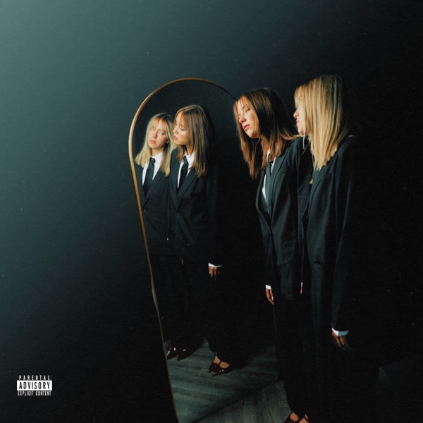 Official single cover artwork which sees KTJ & CARLY dressed in suits, standing next to each other, staring at a mirror at the camera.