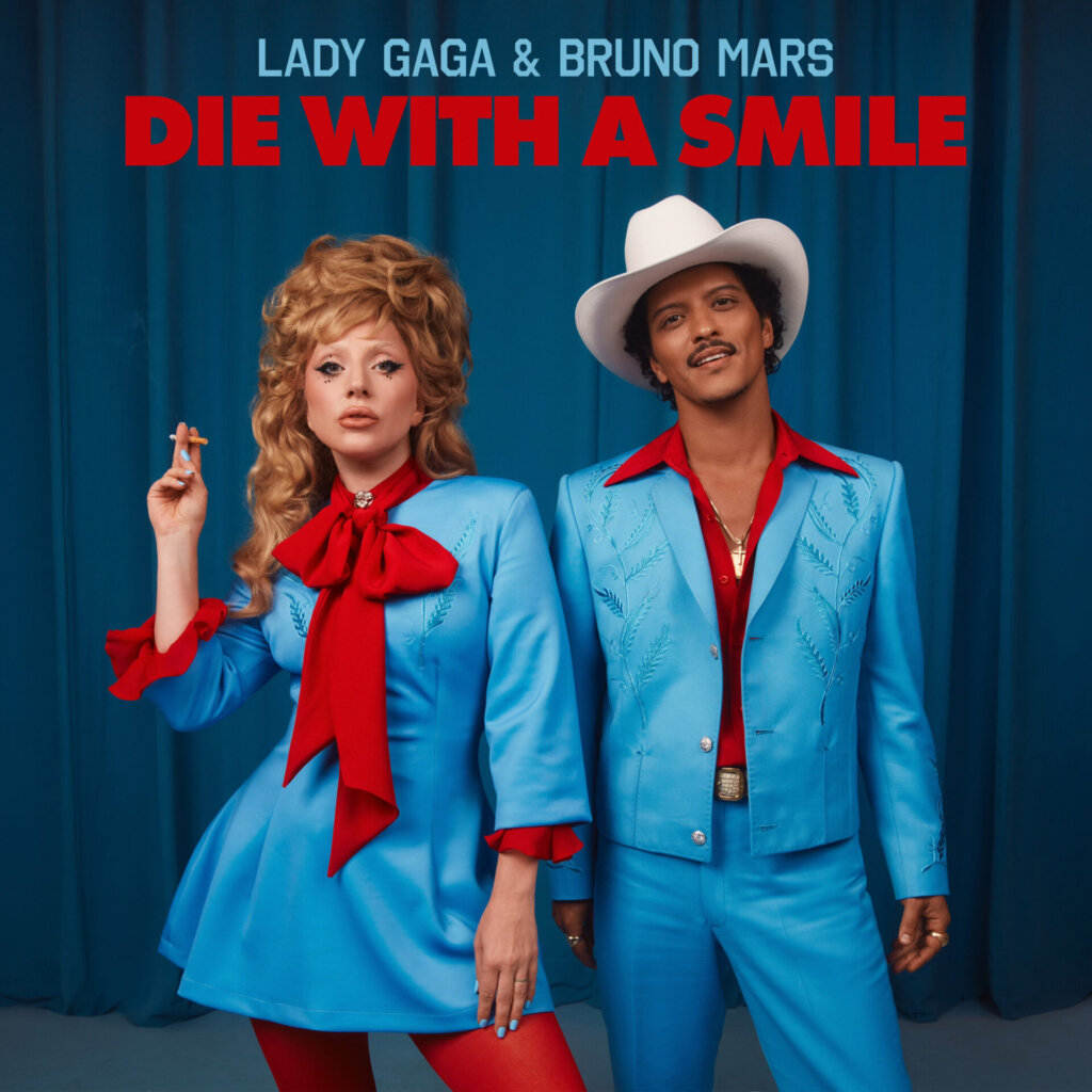 The "Die With a Smile" artwork which shows Lady Gaga on the left in her blue smart dress and red scarf holding a cigarette, and Bruno Mars on the right wearing a matching blue suit, red shirt, and a white cowboy hat.