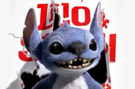 Image from the short teaser clip from Disney's 2025 live-action film "Lilo & Stitch" that shows a fluffy life-like Stitch jumping out from a paper wall that has the words "Lilo & Stitch Summer 2025" on in red lettering.