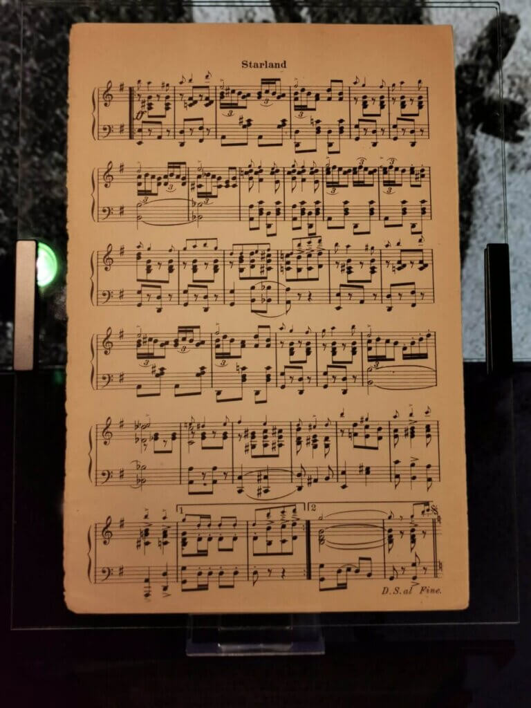 A closer look at the "Nearer My God To Thee" music sheet.