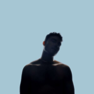 Official single cover artwork for "Like That" which sees Fox Jackson shirtless but covered in shadow, wearing a chocker metal necklace with a baby blue background.