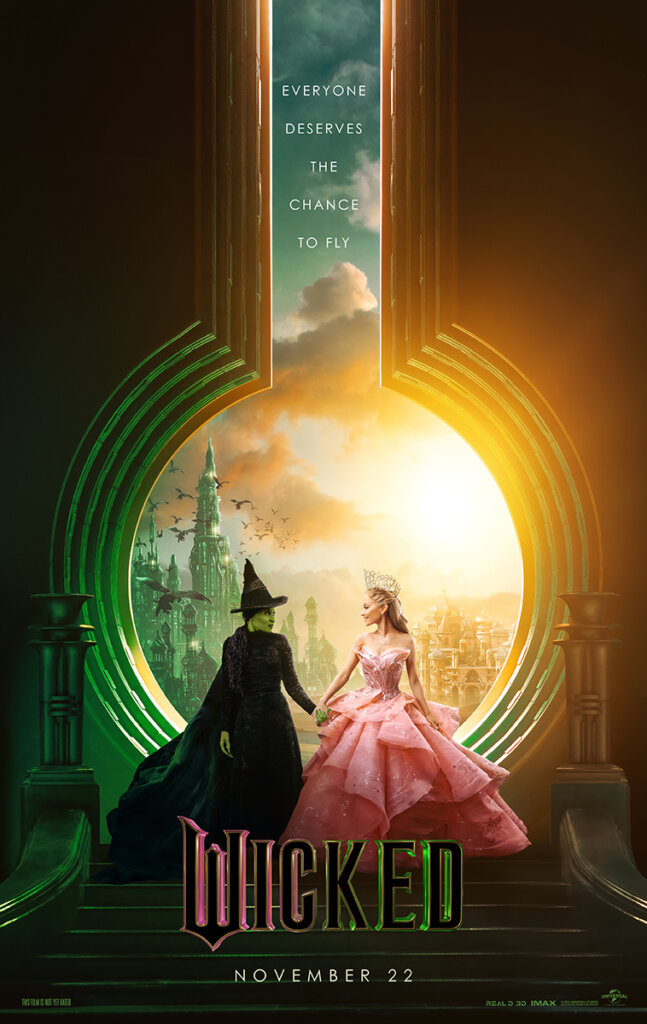 Official poster for Wicked which sees Cynthia Eviro as Elphaba on the left holding hands with Ariana Grande as Galinda, standing in front of a huge keyhole.