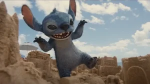 The new CGI Stitch from Lilo & Stitch 2025 film destroying a sand castle from new teaser trailer.