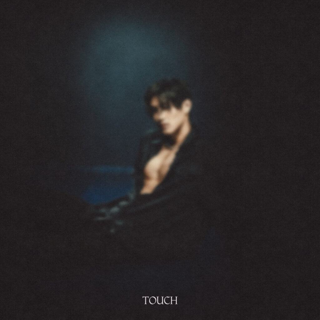 Official single cover artwork for "TOUCH" which sees a sultry guy, sunkis, wearing a black shirt opened at the chest, in a mist-like filter.